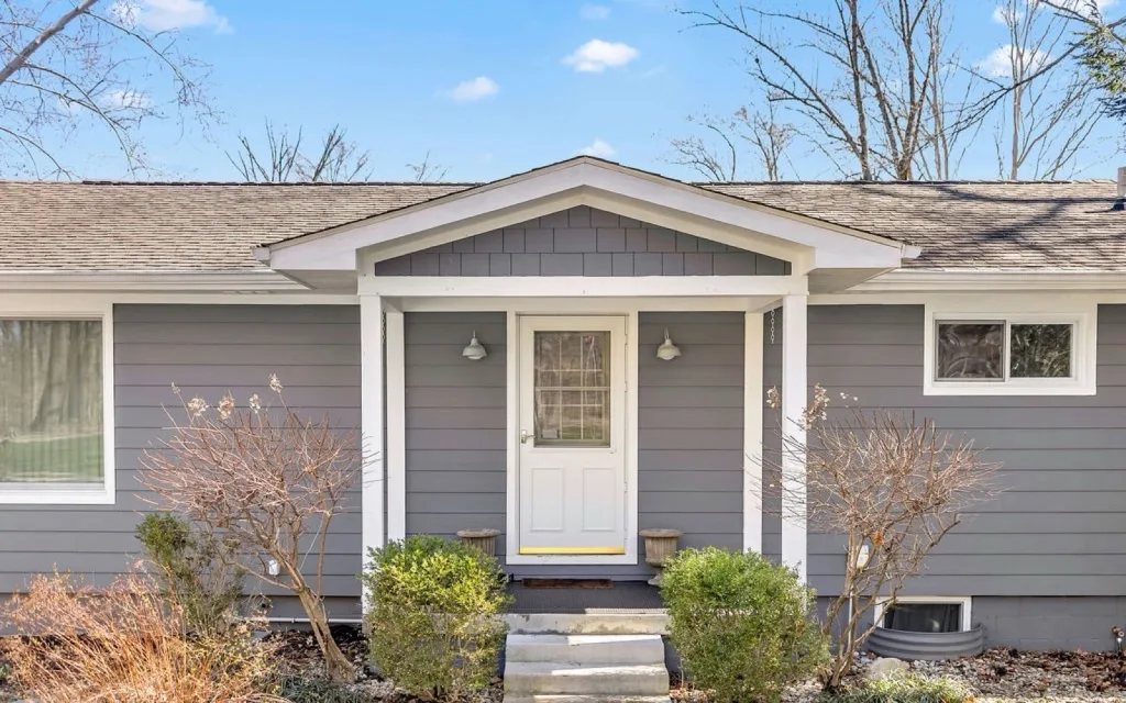 Front of the lake home at 7600 N Blue Heron Dr, Unionville, near Lake Lemon