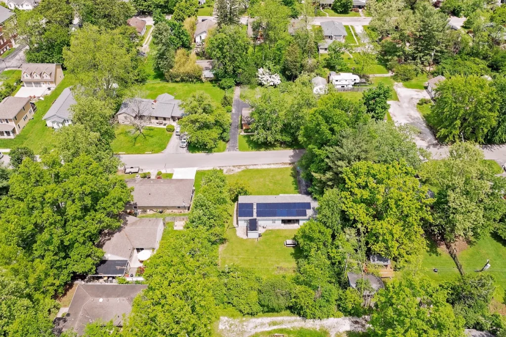 Aerial view of tree-lined streets and homes near Bryan Park in Bloomington