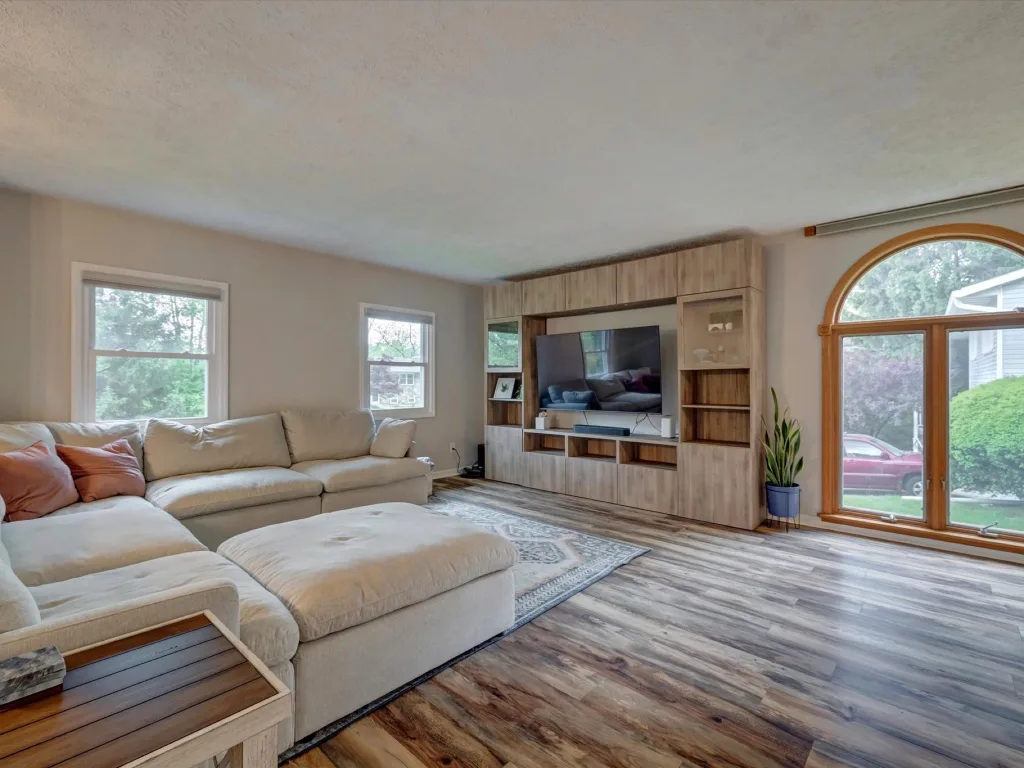 Living room with arched windows in one of Tarah's Bloomington listings