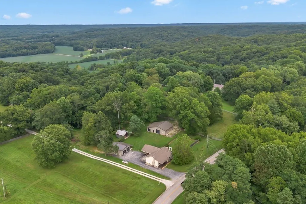 Wooded hills and homes on large lots north of Bloomington